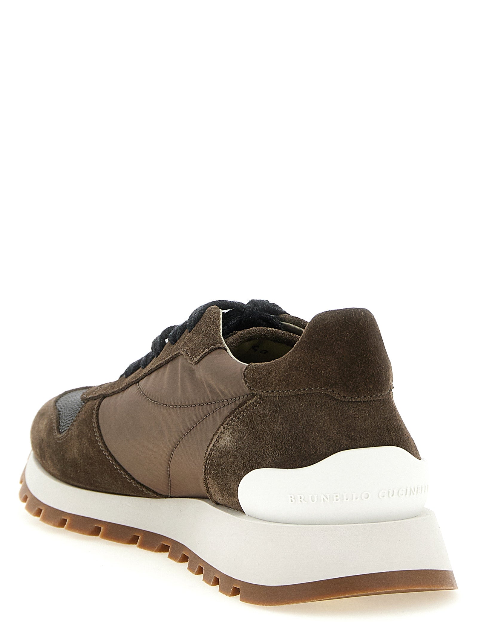 Athletic Sneakers by Brunello Cucinelli for women in bos taurus calfskin suede leather & tu bicolour & green showcases a architectural silhouette, artfully capturing the essence of the Women's Athletic Bos Taurus Calfskin Suede Leather & TU Sneakers with its signature architectural athletic style construction.