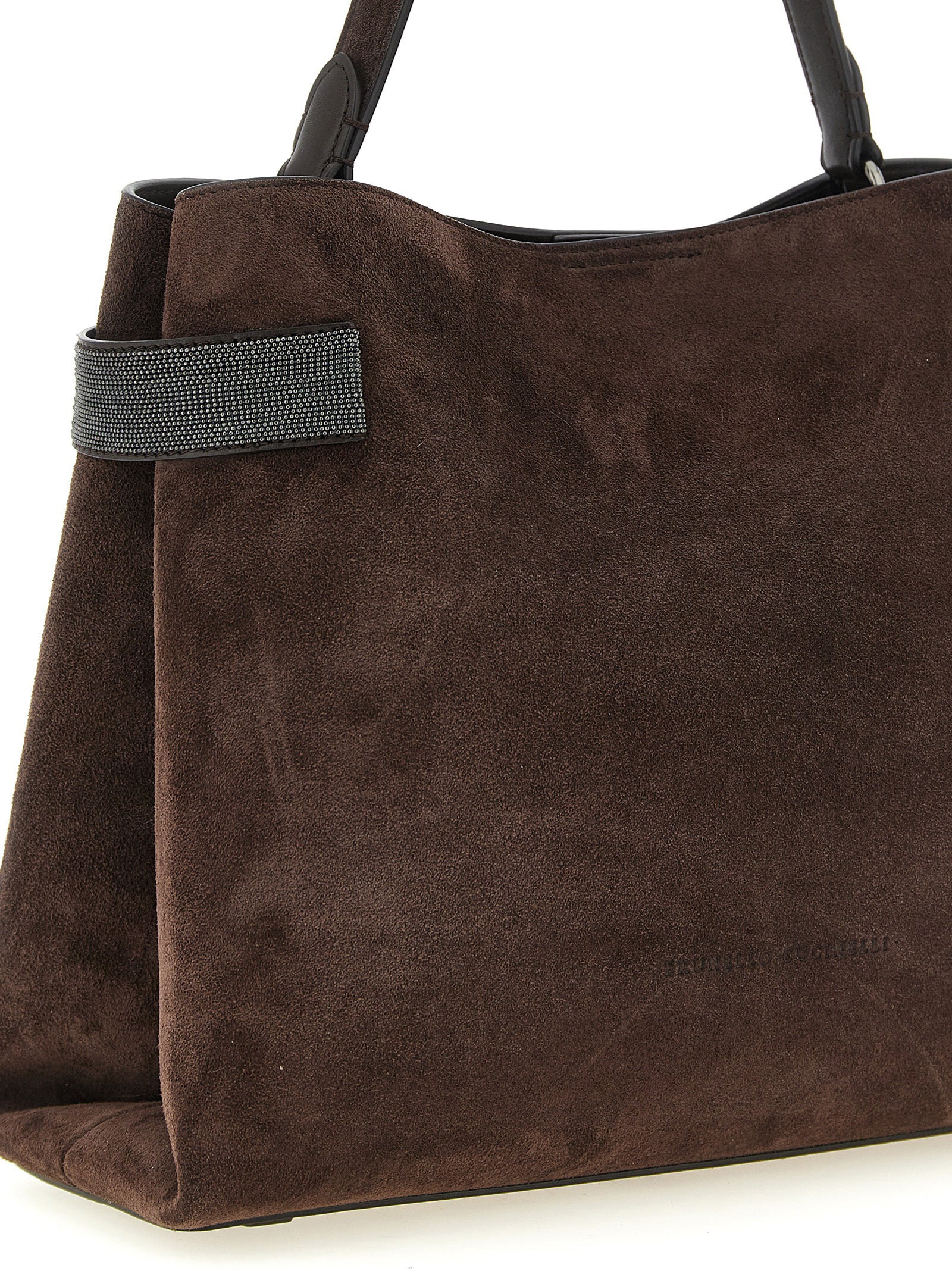 Handbag by Brunello Cucinelli for women in suede calfskin leather brown presents a ornamental silhouette, showcasing a secure magnetic, ample , and versatile shoulder-strap, handle & adjustable-strap for a ornamental finish.