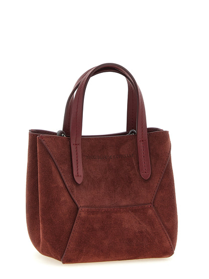 Mini Handbag by Brunello Cucinelli for women in suede calfskin leather bordeaux features a contemporary silhouette, showcasing a secure magnetic, ample , and contemporary shoulder-strap, adjustable-strap & handle for a sophisticated look.
