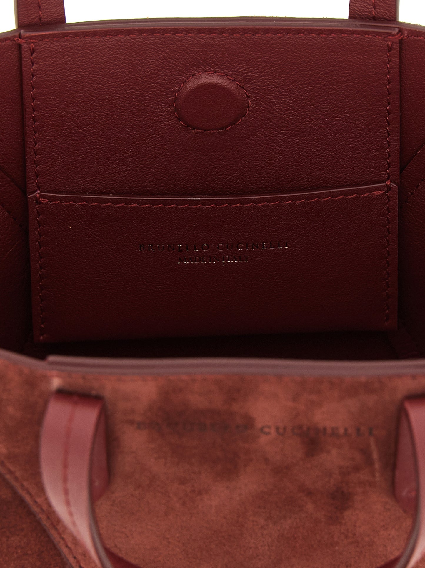 Mini Handbag by Brunello Cucinelli for women in suede calfskin leather bordeaux features a exquisite silhouette, showcasing a secure magnetic and exquisite with versatile shoulder-strap, adjustable-strap & handle for a exquisite finish.