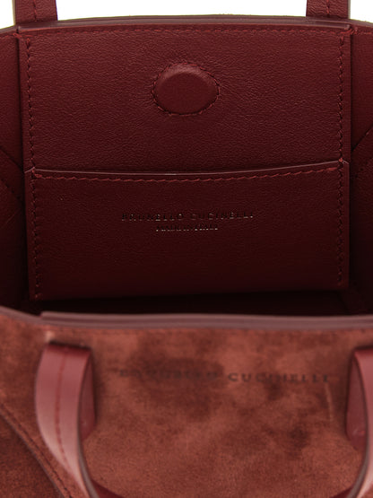 Mini Handbag by Brunello Cucinelli for women in suede calfskin leather bordeaux features a exquisite silhouette, showcasing a secure magnetic and exquisite with versatile shoulder-strap, adjustable-strap & handle for a exquisite finish.