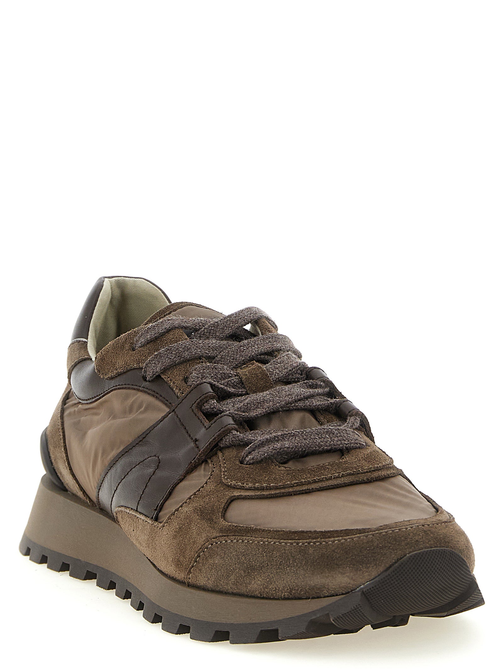 Athletic Sneakers by Brunello Cucinelli for women in tu & calfskin suede leather bicolour & green showcases a architectural silhouette, artfully capturing the essence of the Women's Athletic TU & Calfskin Suede Leather Sneakers with its signature architectural athletic style construction.