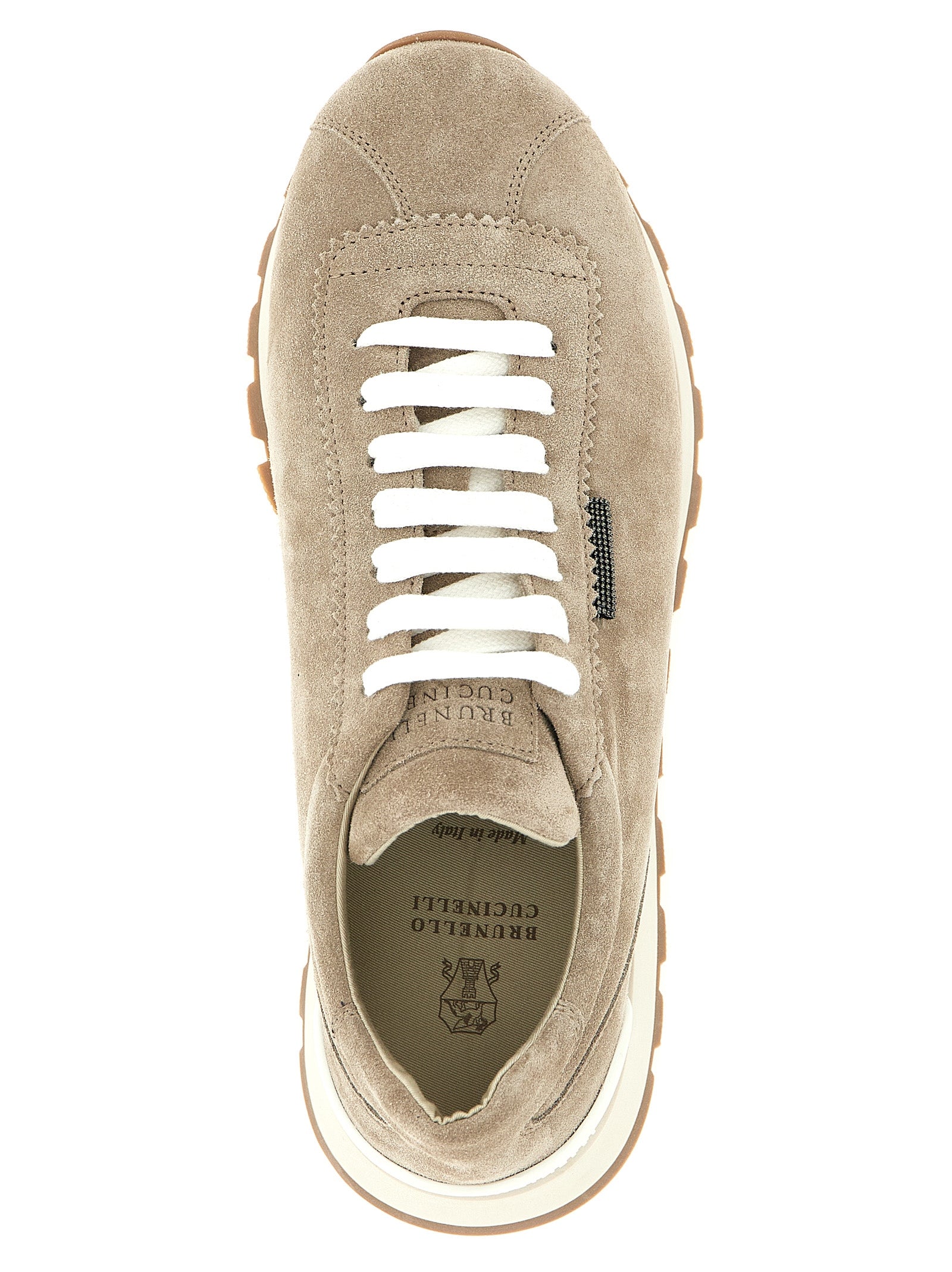 Athletic Sneakers by Brunello Cucinelli for women in bos taurus suede calfskin leather & tu beige showcases a architectural silhouette, artfully capturing the essence of the Women's Athletic Bos Taurus Suede Calfskin Leather & TU Sneakers with its signature architectural athletic style construction.