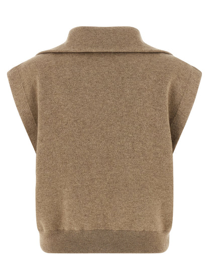Vest by Brunello Cucinelli for women in polyamide leather & cashmere beige features an contemporary silhouette, showcasing refined pockets and a contemporary turtle neckline for a sophisticated layered look.