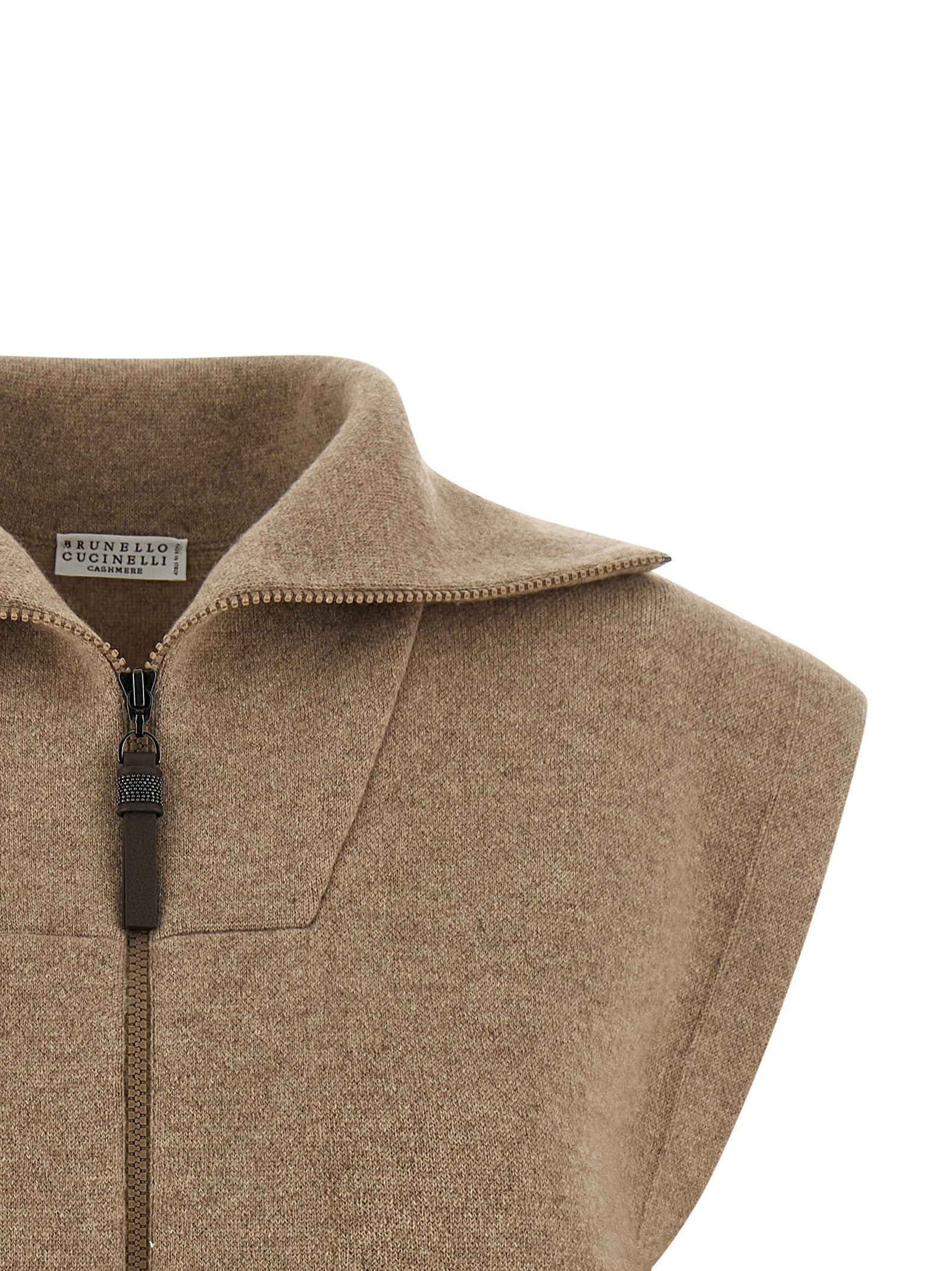 Vest by Brunello Cucinelli for women in polyamide leather & cashmere beige features a stylish silhouette, showcasing distinct pockets and a refined turtle neckline for a truly stylish finish.
