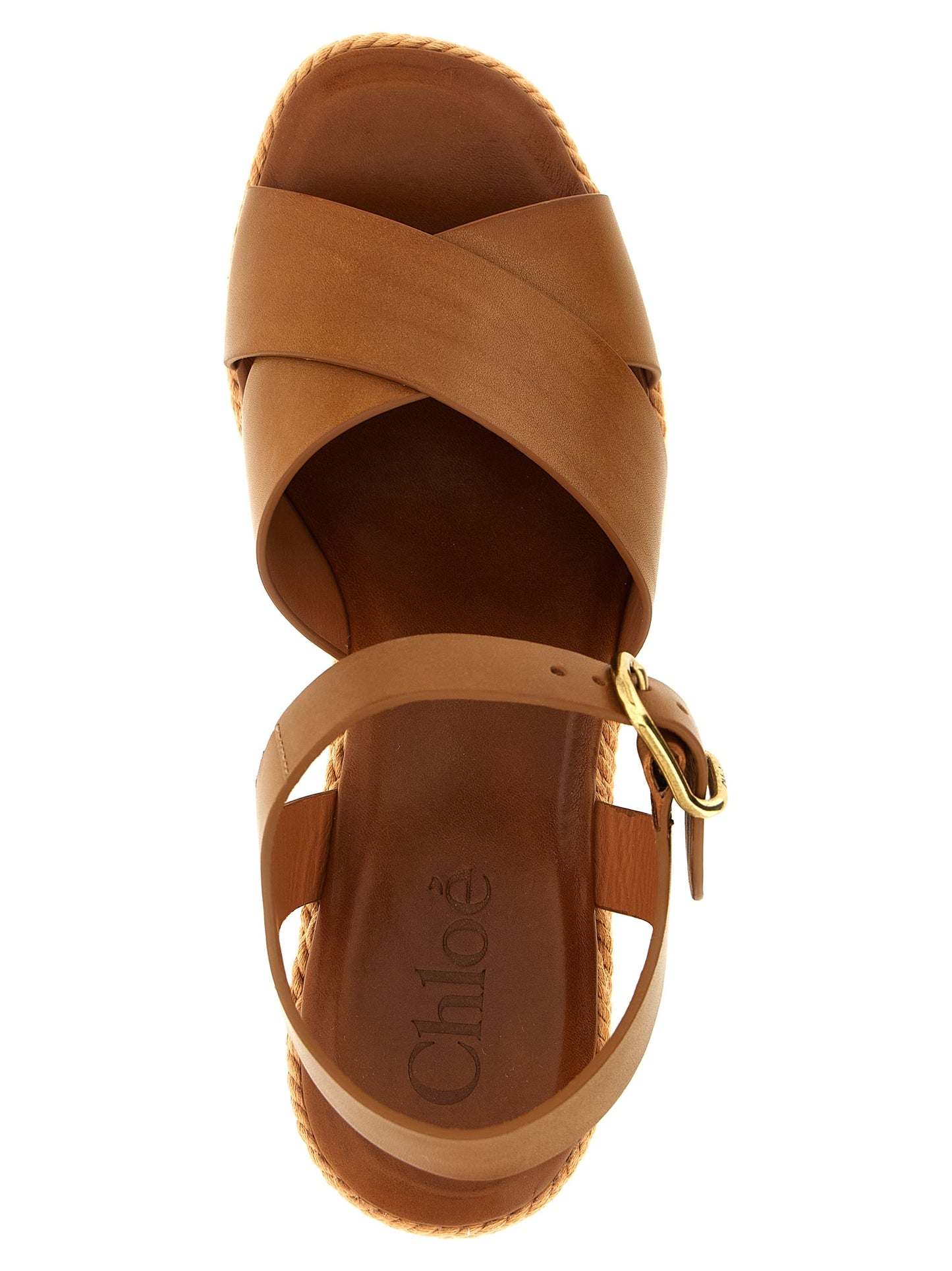 Wedge Ankle Strap Sandals by Chloé for women in calfskin leather & tu brown & signature features an effortlessly chic silhouette from the Women's Calfskin Leather & TU Wedge Ankle Strap Sandals collection, showcasing a effortlessly chic wedge and elegant .