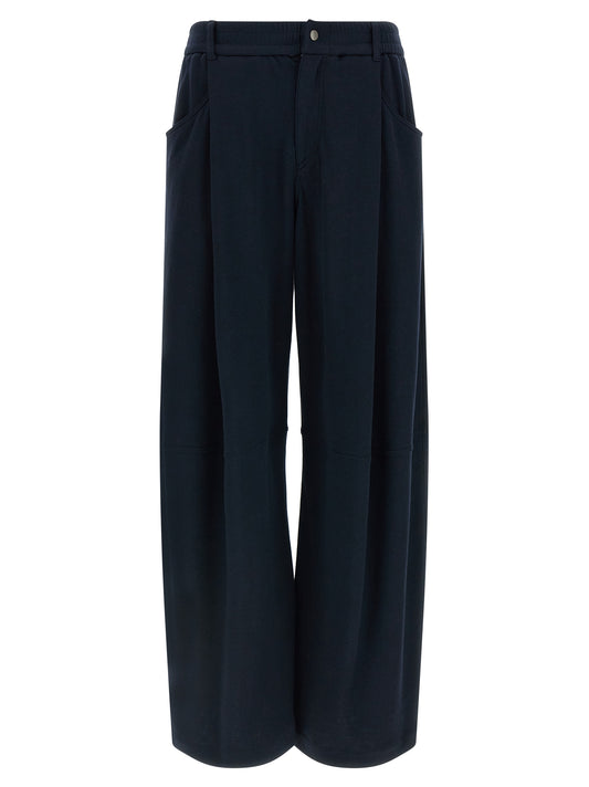 Trousers by Brunello Cucinelli for women in polyamide cotton silk blue presents a perennial silhouette, meticulously tailored with a wide cut, long finish, and an elegant .