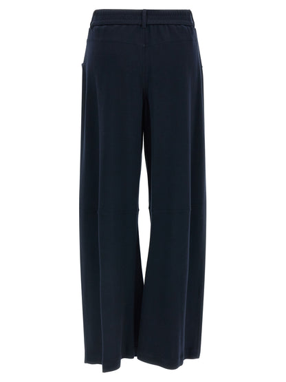 Trousers by Brunello Cucinelli for women in polyamide cotton silk blue features an sartorial silhouette, showcasing a precise wide and long with a sartorial for a refined look.