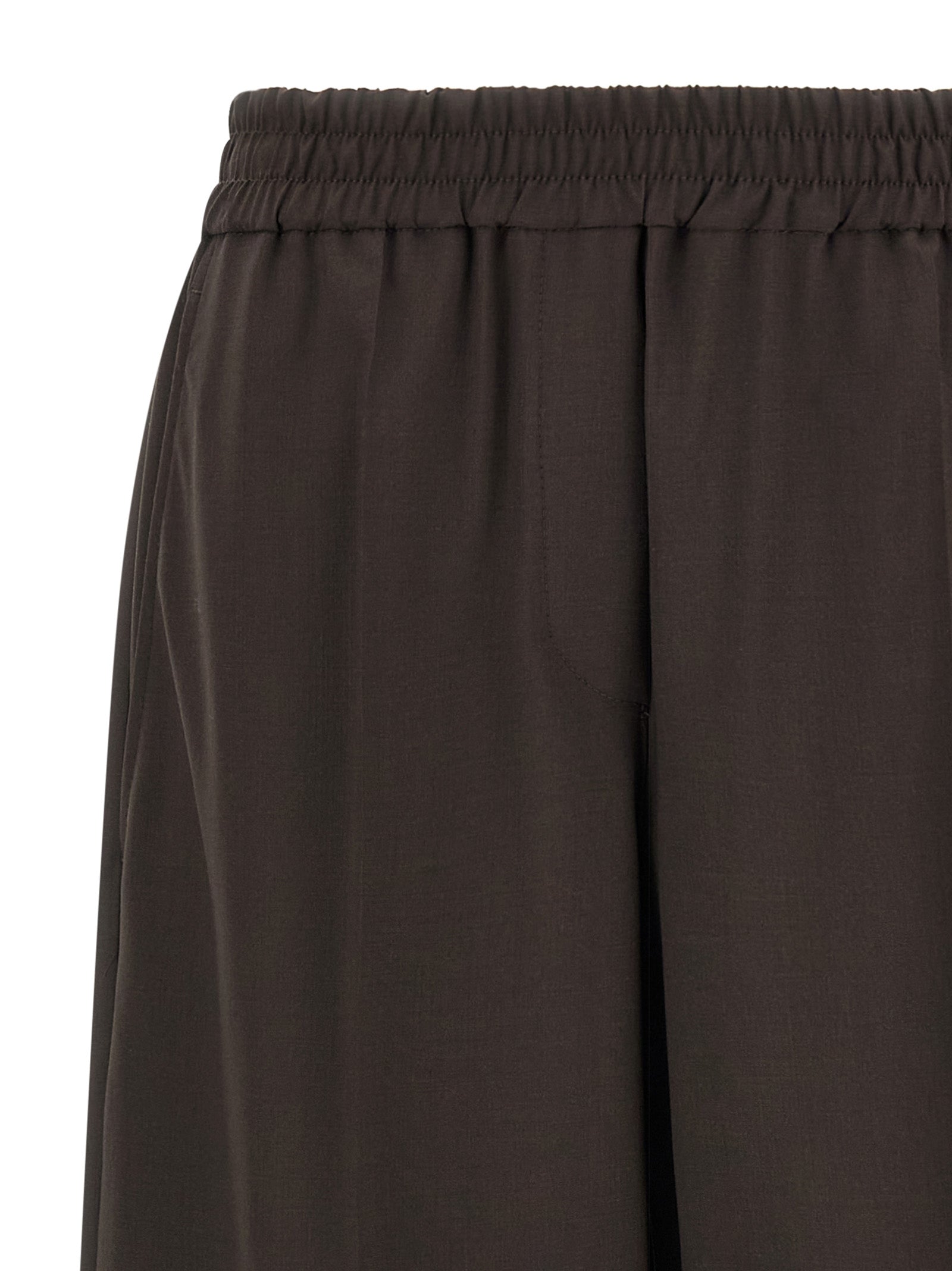Trousers by Brunello Cucinelli for women in virgin wool & polyamide brown presents a smart silhouette, meticulously detailed with a smart straight-leg & wide, a smart long, and a smart .