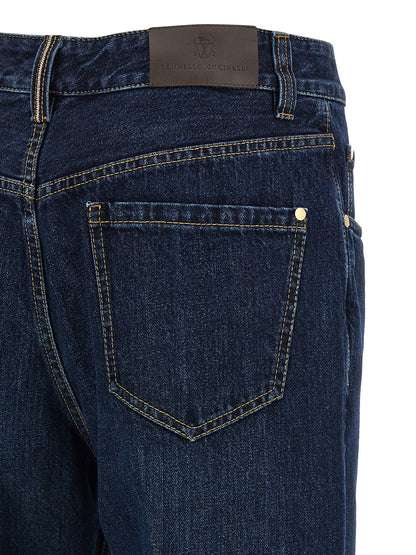 Jeans by Brunello Cucinelli for women in cotton denim blue & signature presents a refined pantology silhouette, artfully defined by a refined pantology straight-leg, wide & cropped, cropped, and a sophisticated .