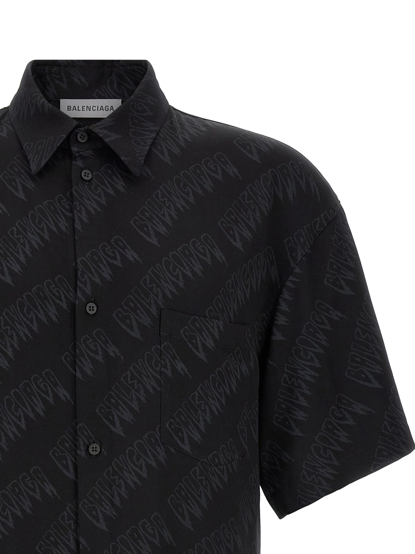 Blouse by Balenciaga for men in viscose black & print showcases a sharp silhouette, elegantly detailed with a sharp and sharp .