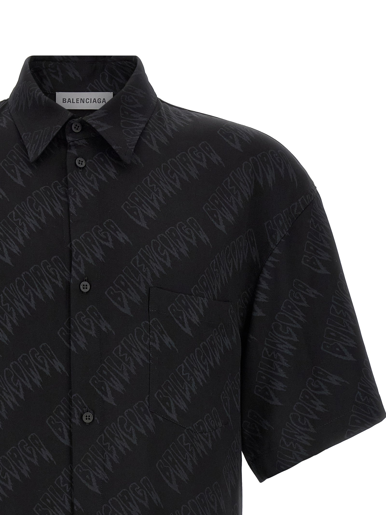 Blouse by Balenciaga for men in viscose black & print showcases a sharp silhouette, elegantly detailed with a sharp and sharp .