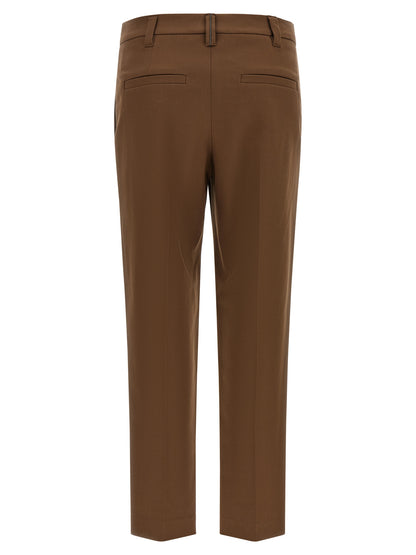 Trousers by Brunello Cucinelli for women in stretch cotton twill brown features an sartorial silhouette, showcasing a precise tapered-leg & cropped and cropped with a sartorial for a refined look.
