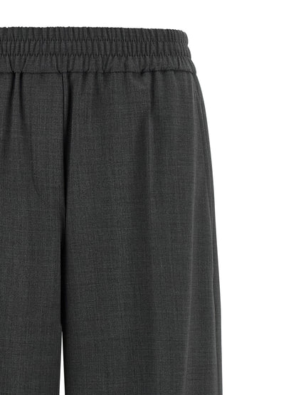 Trousers by Brunello Cucinelli for women in virgin wool & polyamide gray presents a smart silhouette, meticulously detailed with a smart flared & wide, a smart long, and a smart .