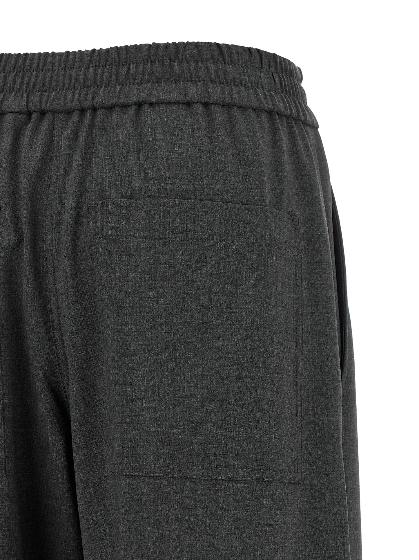 Trousers by Brunello Cucinelli for women in virgin wool & polyamide gray features an sartorial silhouette, showcasing a precise flared & wide and long with a sartorial for a refined look.