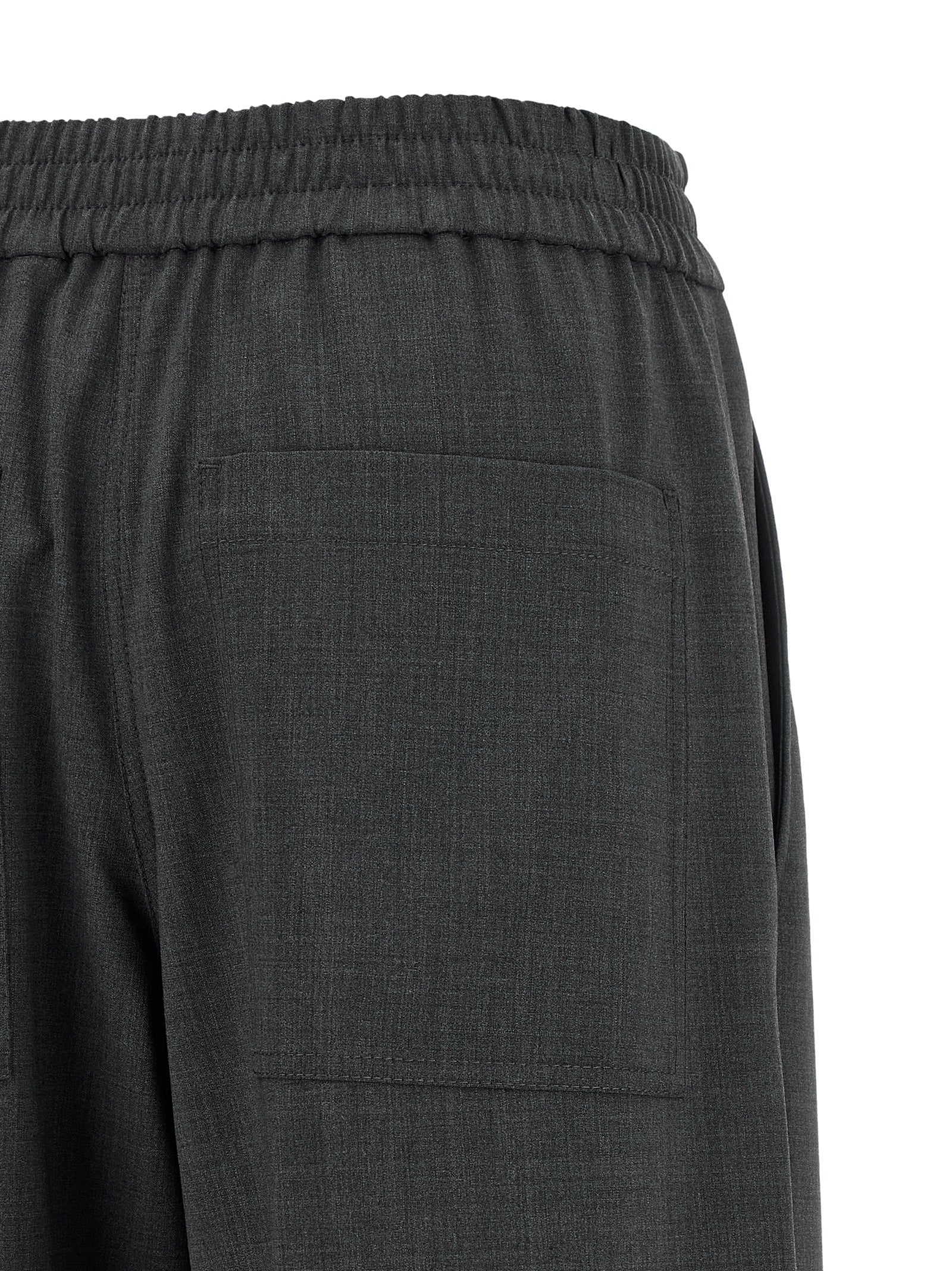 Trousers by Brunello Cucinelli for women in virgin wool & polyamide gray features an sartorial silhouette, showcasing a precise flared & wide and long with a sartorial for a refined look.