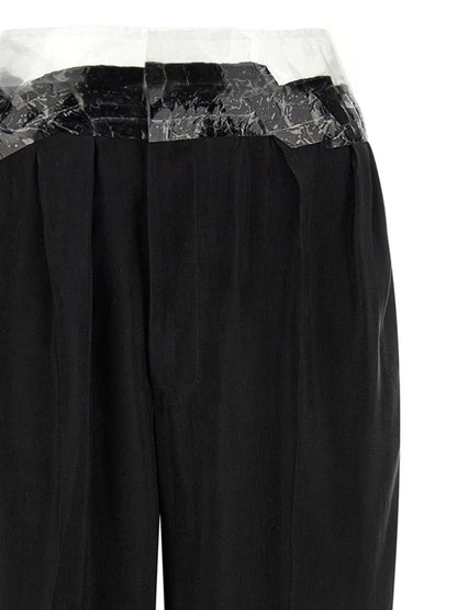 Casual Pants by Maison Margiela for women in cupro & copper black, copper, transparent & signature presents a tailored silhouette, showcasing a tailored straight-leg & wide and long cut with a refined for a truly tailored aesthetic.
