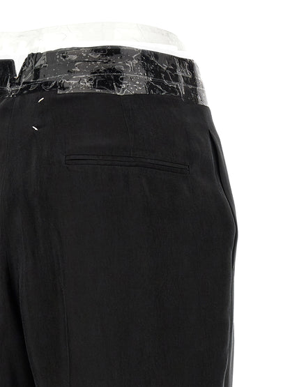Casual Pants by Maison Margiela for women in cupro & copper black, copper, transparent & signature features a polished silhouette with a polished straight-leg & wide, reaching a polished long and finished with a polished .