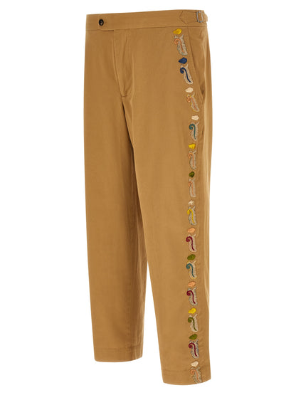 Trousers by BODE for men in cotton beige features an sartorial silhouette, showcasing a precise straight-leg, wide & cropped and cropped with a sartorial for a refined look.