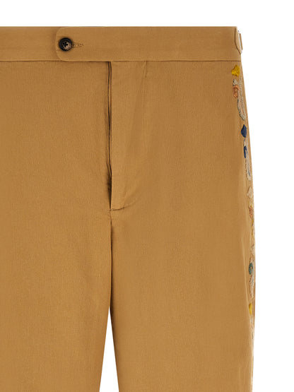 Trousers by BODE for men in cotton beige presents a smart silhouette, meticulously detailed with a smart straight-leg, wide & cropped, a smart cropped, and a smart .