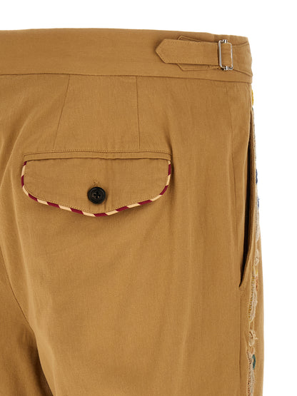 Trousers by BODE for men in cotton beige features an sartorial silhouette, showcasing a precise straight-leg, wide & cropped and cropped with a sartorial for a refined look.