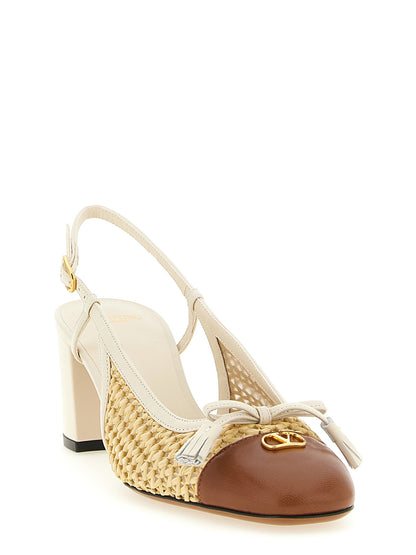 Mid-Heel Slingback Pumps Heels by Valentino Garavani for women in raffia & goatskin leather beige & signature features an effortlessly chic silhouette from the V Logo Women's Raffia & Goatskin Leather Mid-Heel Slingback Pumps Heels collection, showcasing a mid-heel and effortlessly chic square toe style for a effortlessly chic look.
