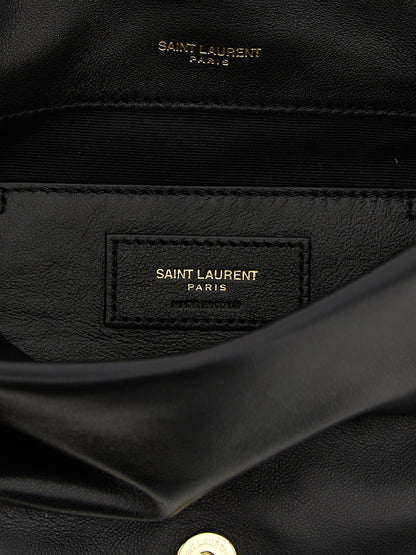 Mini Quilted Shoulder Flap Bag by Saint Laurent for women in lamb leather black presents a versatile silhouette, showcasing a secure flap & magnetic and versatile with versatile shoulder-strap for a sophisticated look.