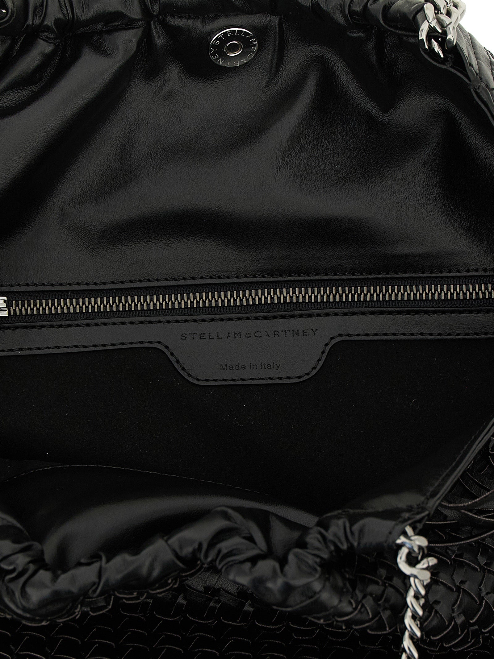 Medium Shoulder Bag by Stella McCartney for women in polyamide black & signature features a effortless sophistication silhouette, secured by a magnetic with ample and versatile shoulder-strap & handle for a effortless sophistication finish.