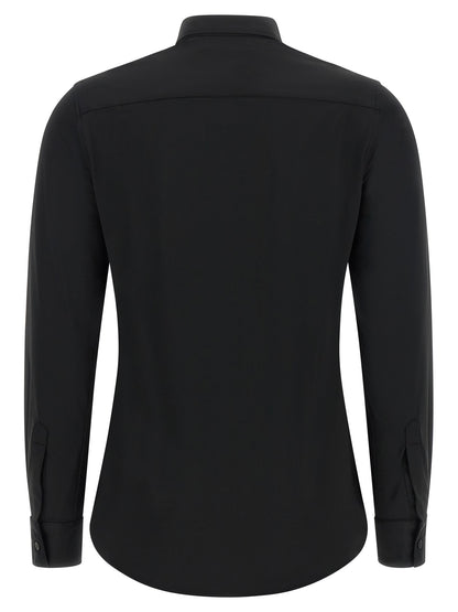 Blouse by XACUS for women in stretch polyamide black features an architectural silhouette with a refined and elegant for a architectural look.