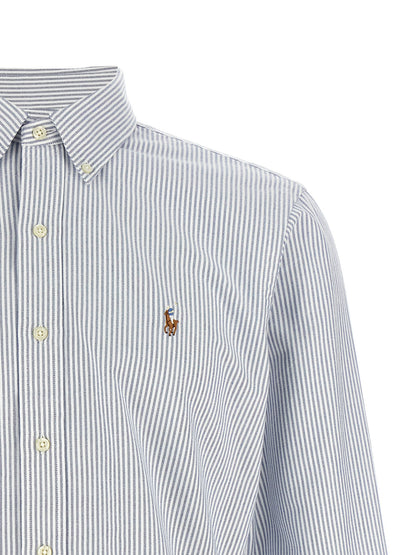 Shirt by Polo Ralph Lauren for men in cotton light-blue, patterned, signature & striped showcases a sharp silhouette, elegantly detailed with a sharp and sharp .