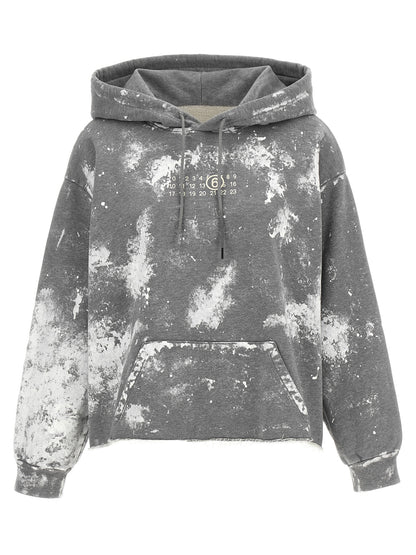 Sweatshirt Hoodie by MM6 Maison Margiela for women in cotton gray, white, signature & print features an luminous silhouette, showcasing a sophisticated hooded neckline and long-sleeve for a truly luminous look.