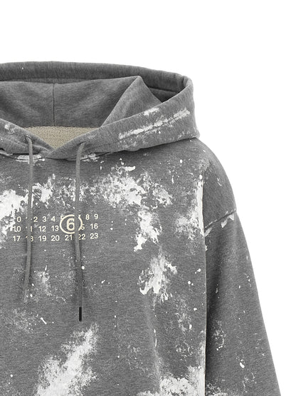 Sweatshirt Hoodie by MM6 Maison Margiela for women in cotton gray, white, signature & print features a authentic silhouette, showcasing a sophisticated hooded neckline and authentic detail for a refined finish.