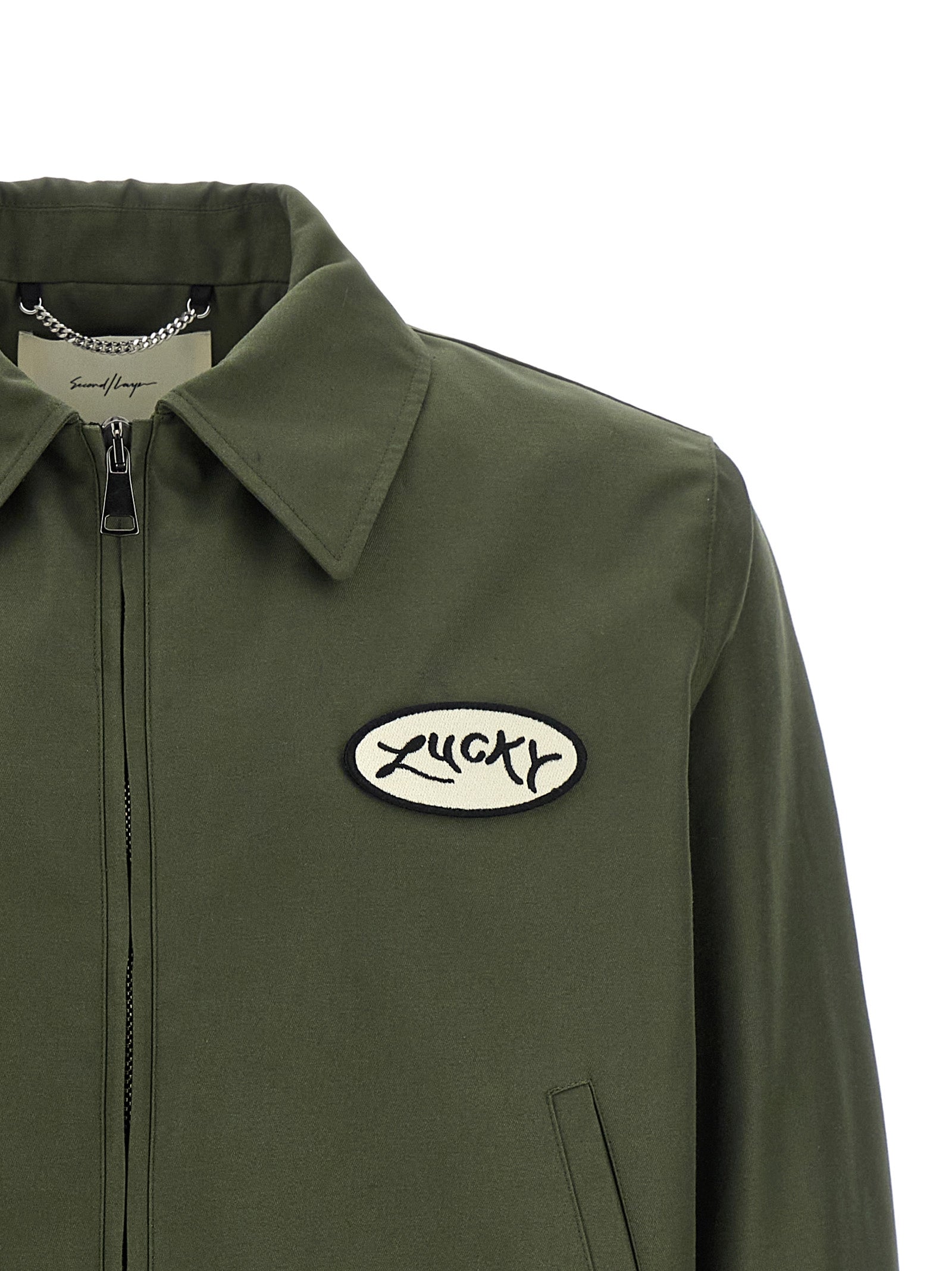 Overcoat by SECOND/LAYER for men in cotton polyester canvas bicolour, green & monogram features a cosy chic silhouette, artfully detailed with a sophisticated shirt-collar neckline and premium pockets for a cosy chic finish.