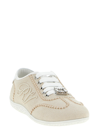 Sneakers by Roger Vivier for women in polyamide leather beige presents a on trend silhouette from the Viv Women's Low Top Polyamide Leather Sneakers collection, showcasing a on trend low-top style for an elevated aesthetic.