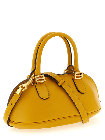 Mini Bowling Handbag by Balenciaga for women in calfskin leather bicolour & yellow features a signature silhouette, showcasing a secure zipper and signature with versatile shoulder-strap, adjustable-strap & handle for a sophisticated look.