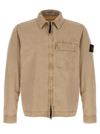 Overshirt by Stone Island for men in cotton canvas beige & signature, featuring a nuanced and nuanced for a sophisticated finish.