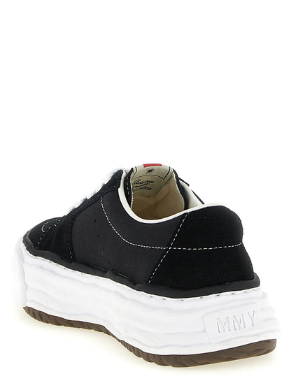 Sneakers by Maison Mihara Yasuhiro for men in suede cowhide leather & canvas black presents a sumptuous silhouette, artfully capturing the essence of the Men's Fashion Suede Cowhide Leather & Canvas Sneakers with its sumptuous fashion style design.