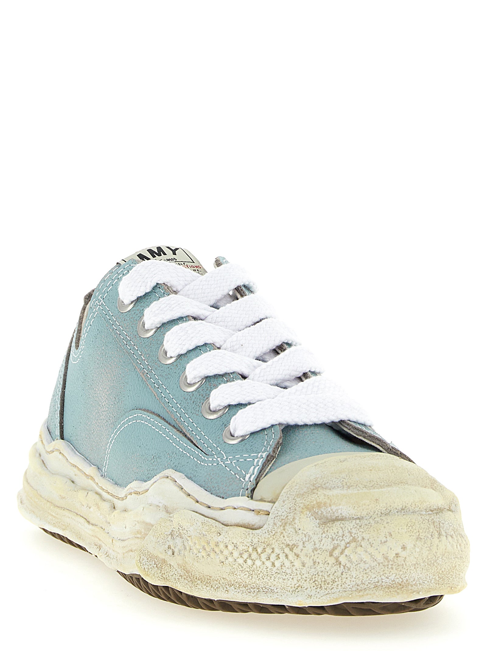Sneakers by Maison Mihara Yasuhiro for men in cowhide leather light-blue & natural presents a sumptuous silhouette, artfully capturing the essence of the Men's Low Top Cowhide Leather Sneakers with its sumptuous low-top style design.