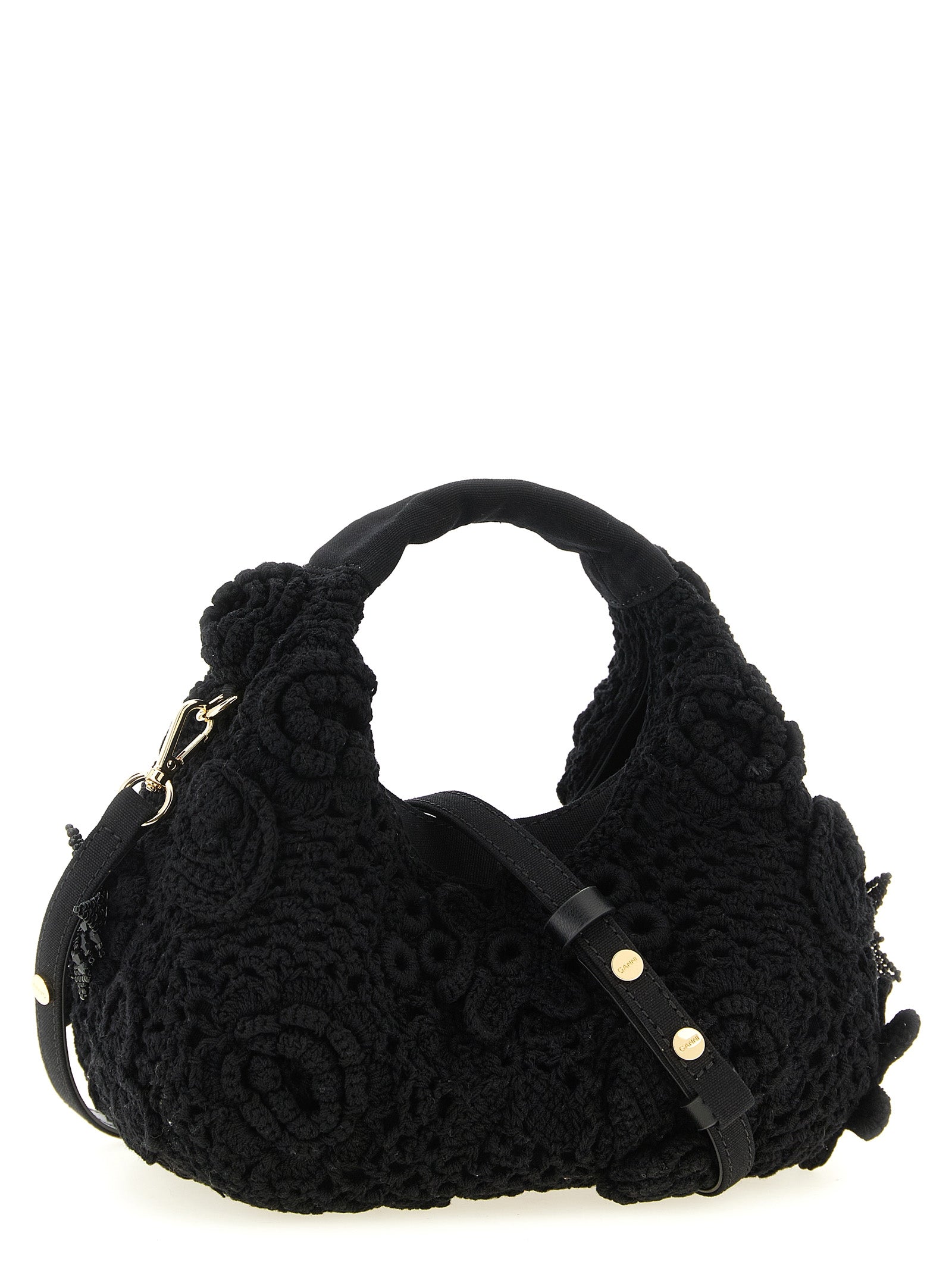 This Mini Hobo Handbag by Ganni for women in organic cotton & leather and black & floral presents a sculptural silhouette featuring a secure magnetic, ample , and versatile shoulder-strap & adjustable-strap for a sculptural finish.