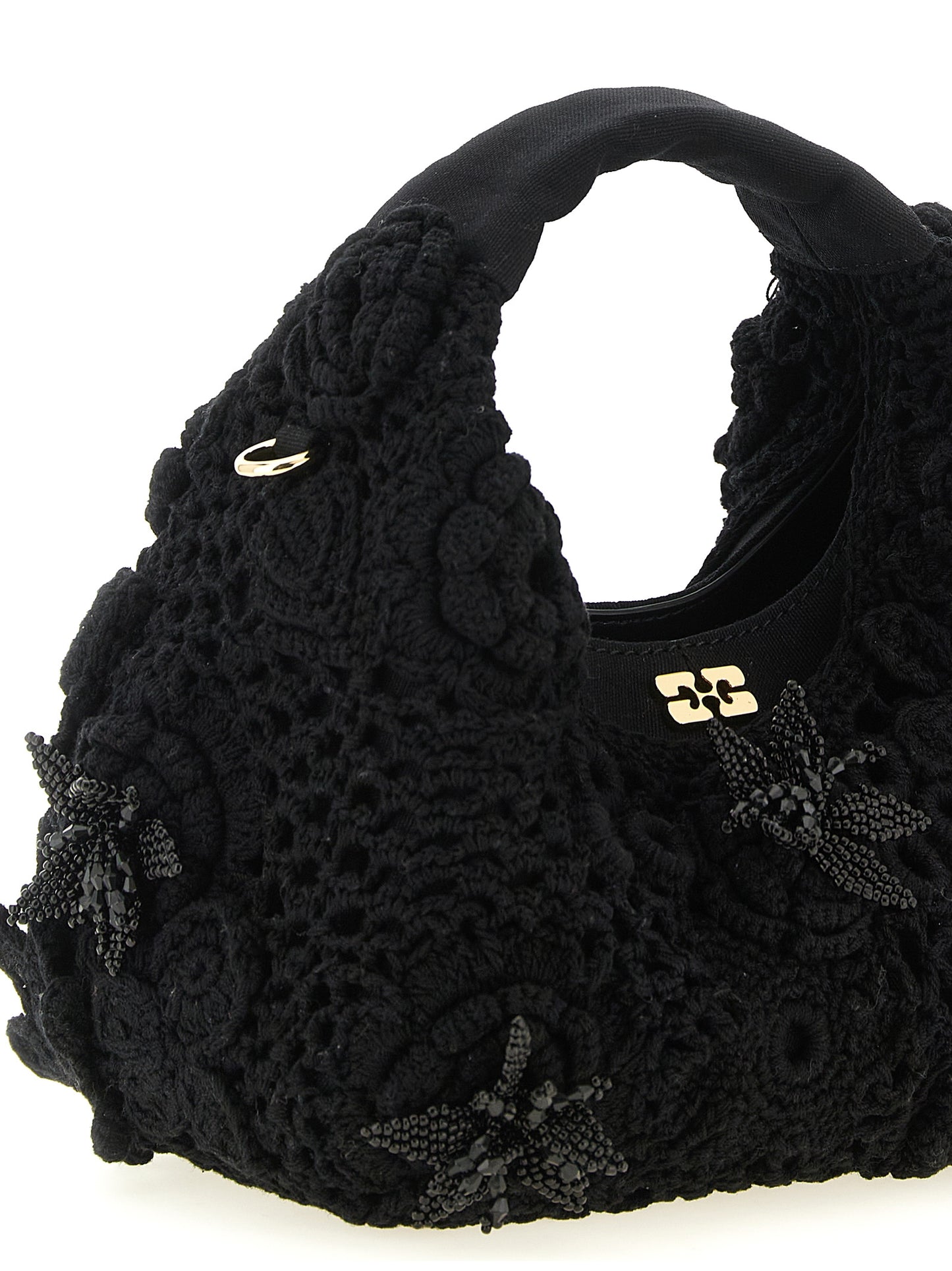 Mini Hobo Handbag by Ganni for women in organic cotton & leather black & floral features an refined silhouette, showcasing a secure magnetic, ample , and versatile shoulder-strap & adjustable-strap for a sophisticated refined aesthetic.
