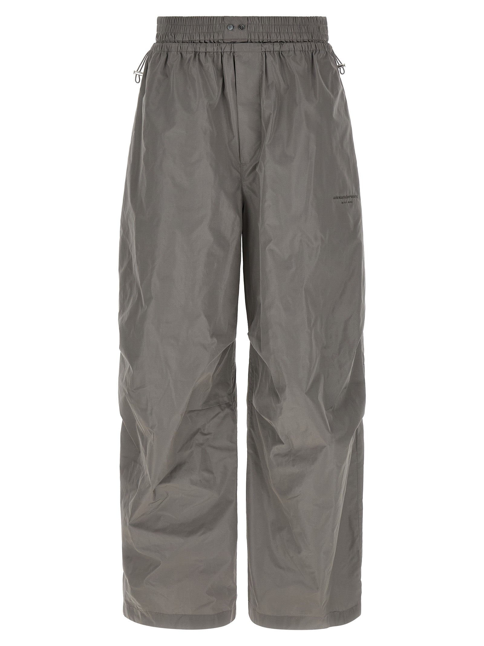 Joggers by Alexander Wang for women in polyester gray features an sophisticated and athletic & wide with a precise long, creating a sophisticated and sophisticated silhouette.