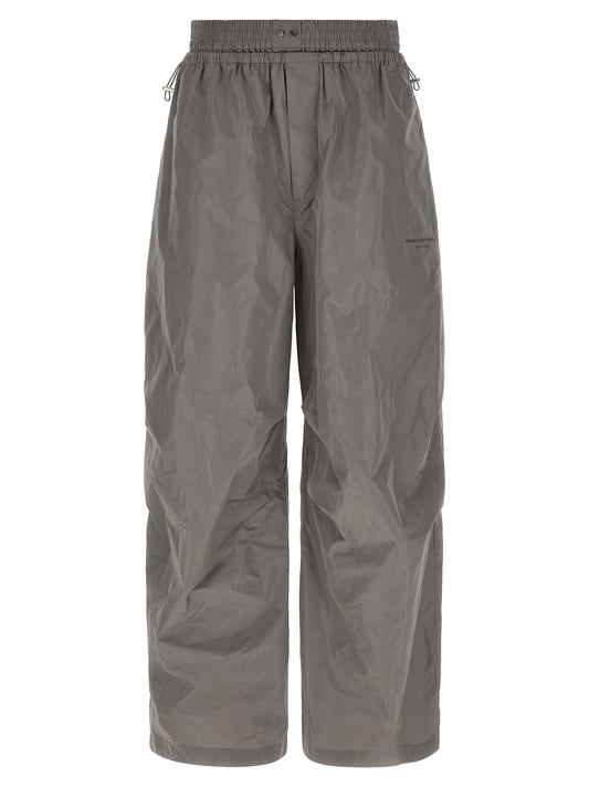 Joggers by Alexander Wang for women in polyester gray features an sophisticated and athletic & wide with a precise long, creating a sophisticated and sophisticated silhouette.