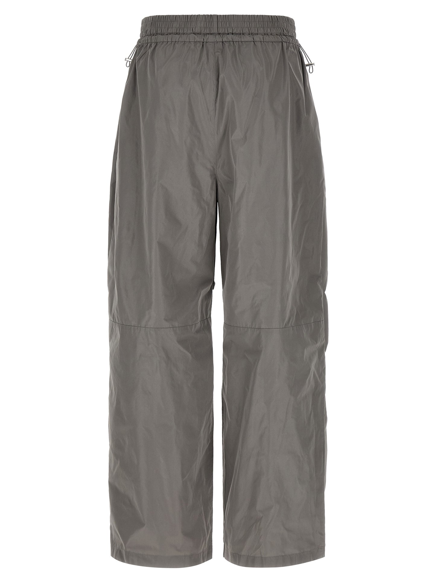 Joggers by Alexander Wang for women in polyester gray features a polished silhouette with a polished athletic & wide, reaching a polished long and finished with a polished .