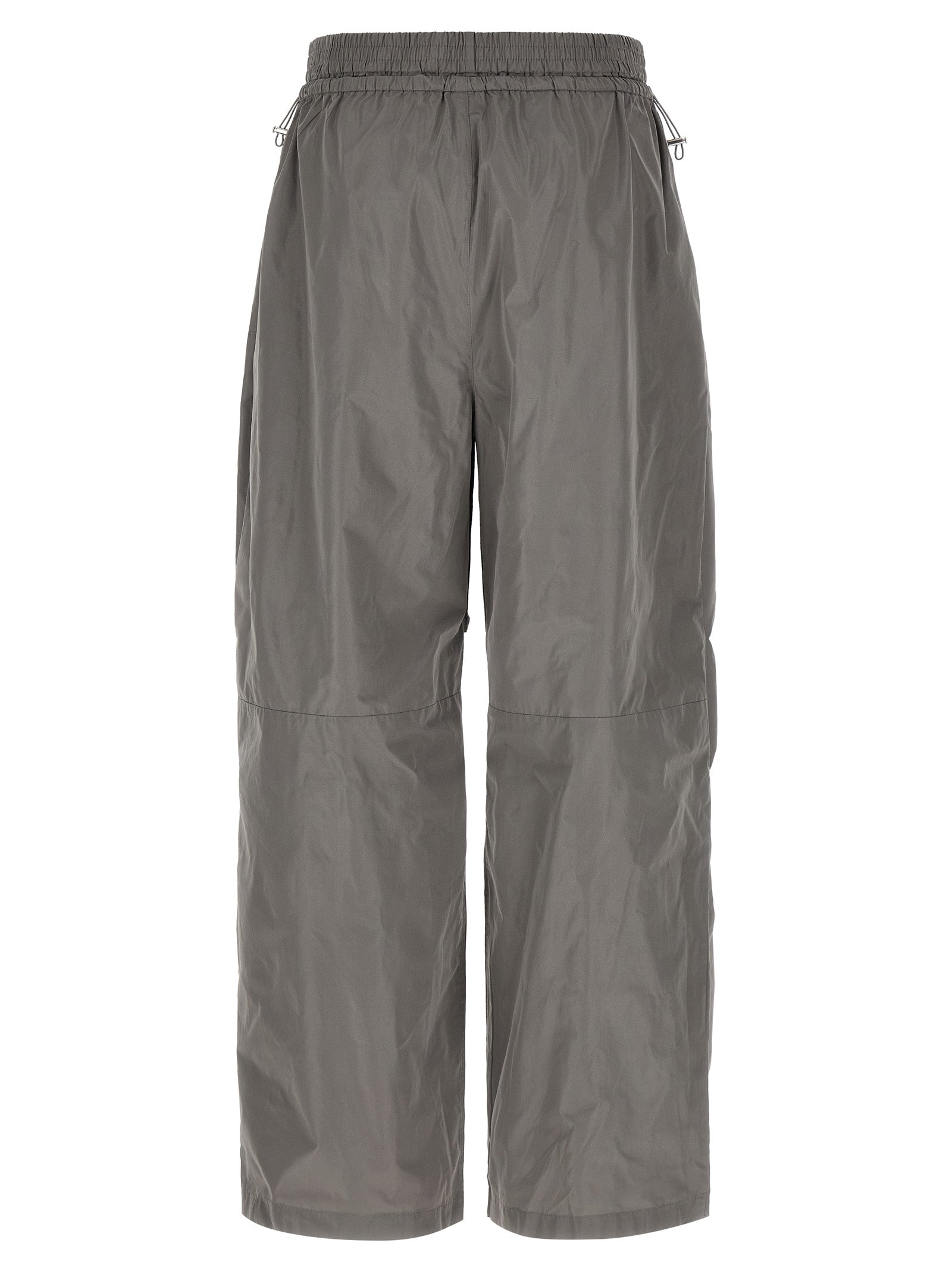 Joggers by Alexander Wang for women in polyester gray features a polished silhouette with a polished athletic & wide, reaching a polished long and finished with a polished .