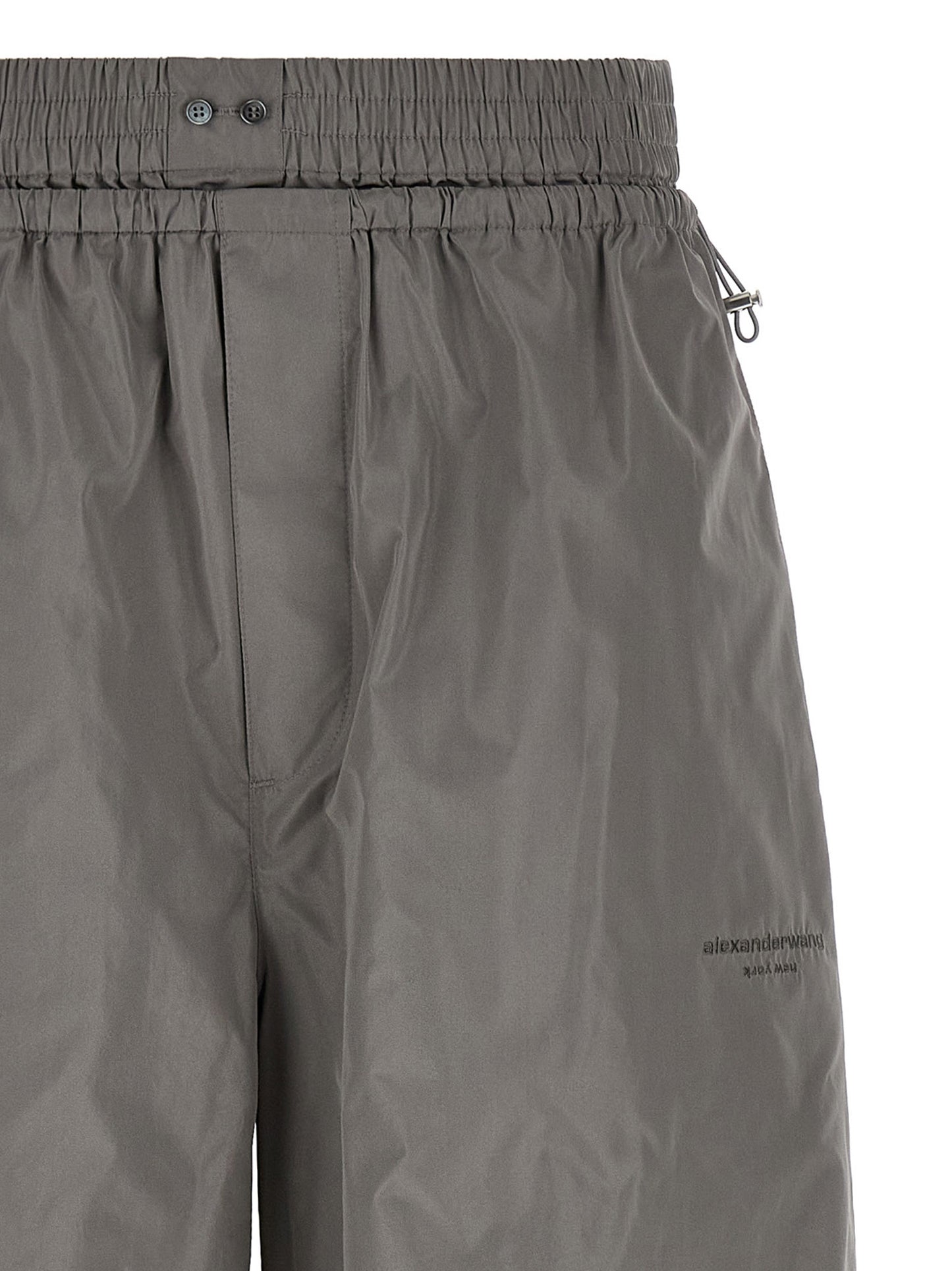 Joggers by Alexander Wang for women in polyester gray features a refined silhouette with a refined athletic & wide, defined by a and a refined long for a refined finish.