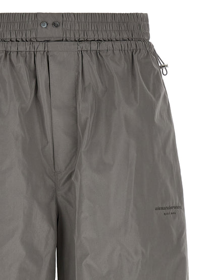 Joggers by Alexander Wang for women in polyester gray features a refined silhouette with a refined athletic & wide, defined by a and a refined long for a refined finish.