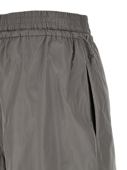Joggers by Alexander Wang for women in polyester gray presents a refined pantology silhouette, artfully defined by a refined pantology athletic & wide, long, and a sophisticated .
