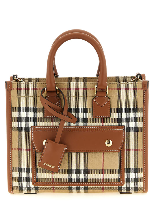 Mini Crossbody Travel Satchel Tote Bag by Burberry for women in poly cotton & calfskin leather beige features a distinguished Freya Poly Cotton & Calfskin Leather Mini Crossbody Travel Satchel Tote Bag design, complete with a secure , ample external-pockets, and versatile crossbody-strap, shoulder-strap, adjustable-strap & detachable-strap for a distinguished look.
