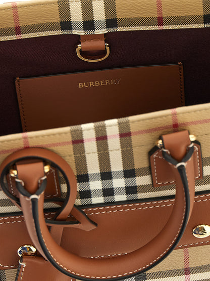 Mini Crossbody Travel Satchel Tote Bag by Burberry for women in poly cotton & calfskin leather beige features an sumptuous Freya Poly Cotton & Calfskin Leather Mini Crossbody Travel Satchel Tote Bag design with a secure , ample external-pockets, and versatile crossbody-strap, shoulder-strap, adjustable-strap & detachable-strap for an sumptuous finish.