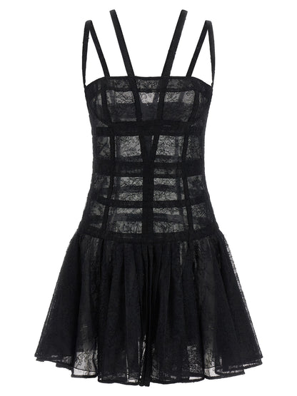Dress by Giovanni Bedin for women in polyamide viscose black & transparent features a dramatic silhouette, showcasing an elegant and sleeveless that flows into a dramatic short mini.